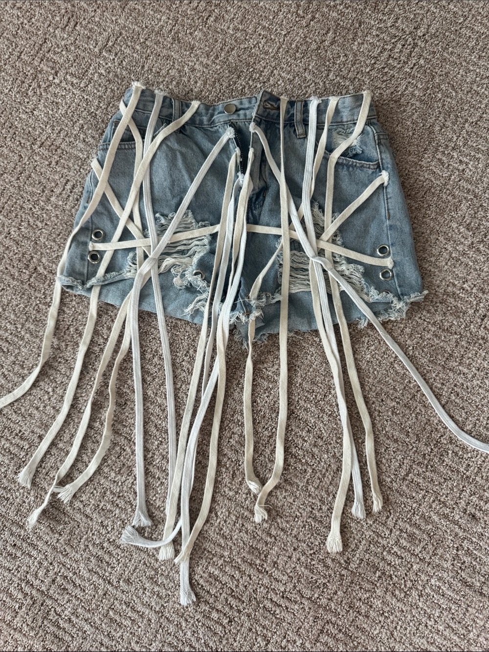 Distressed Light Blue Denim Shoe Lace Grommet Fringe Shorts